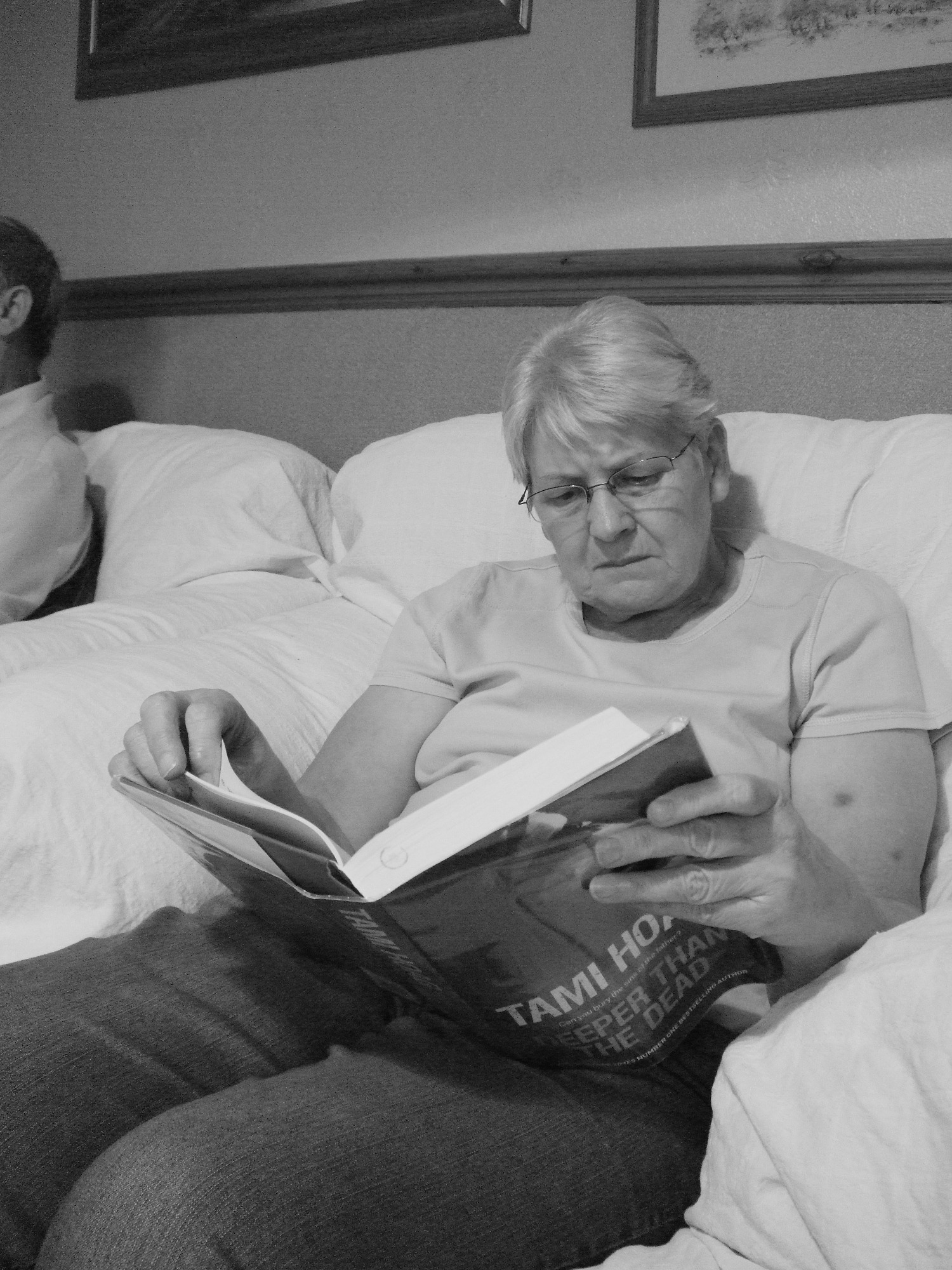 #6 10th August 2010 Reading a Tami Hoag book